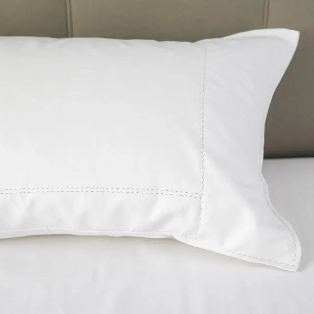 Detailed stitching on a pillowcase