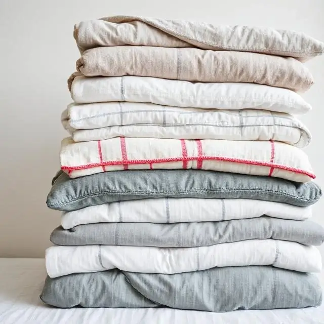 A stack of folded bedding